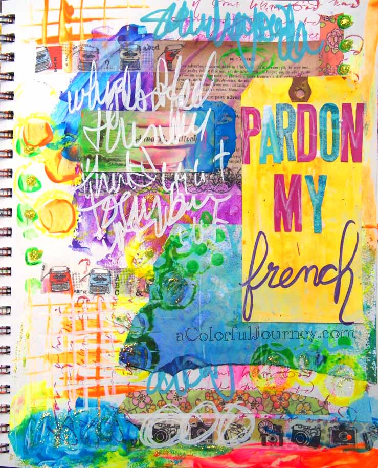 Video of a colorful art journal page with Carolyn Dube