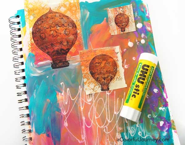 She started this art journal page with a big random mess and the shares it layer by layer!