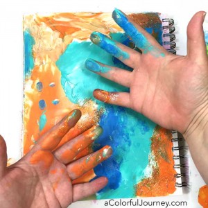 Finding inspiration for play from kids for this Let’s Play video all about fingerpainting in an art journal