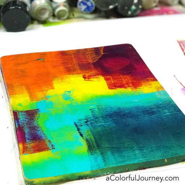 Gel printing with a toy action figure and Golden Open paints on a Gel Press Plate video tutorial by Carolyn Dube