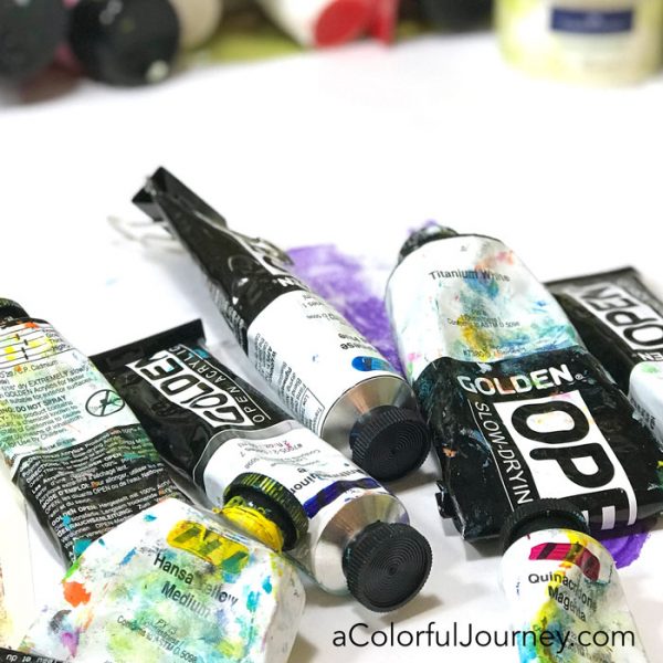 Gel printing with a toy action figure and Golden Open paints on a Gel Press Plate video tutorial by Carolyn Dube